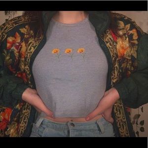 A floral and stripped, blue crop top